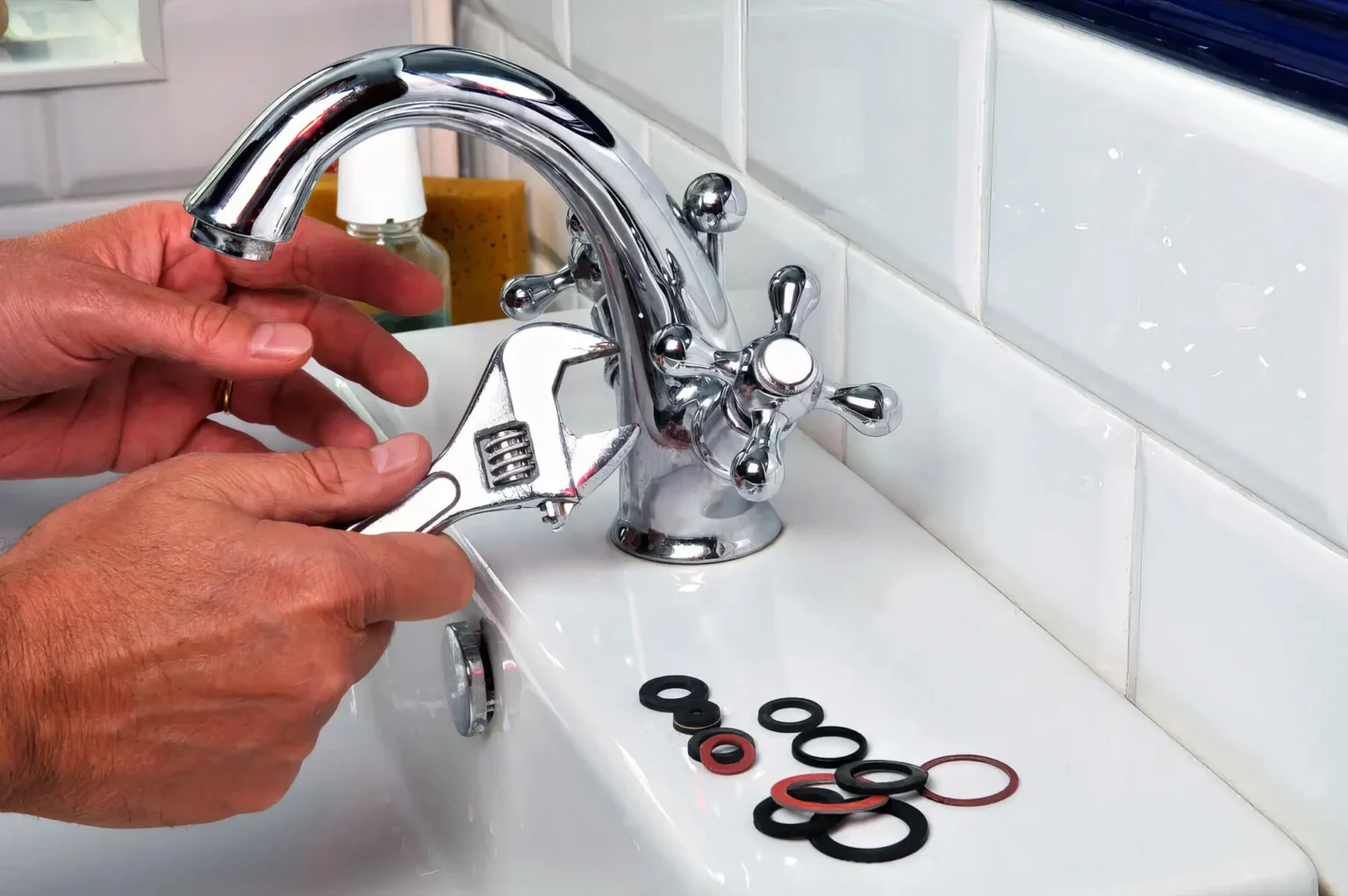 Plumber maintaining a bathroom faucet in Gardena